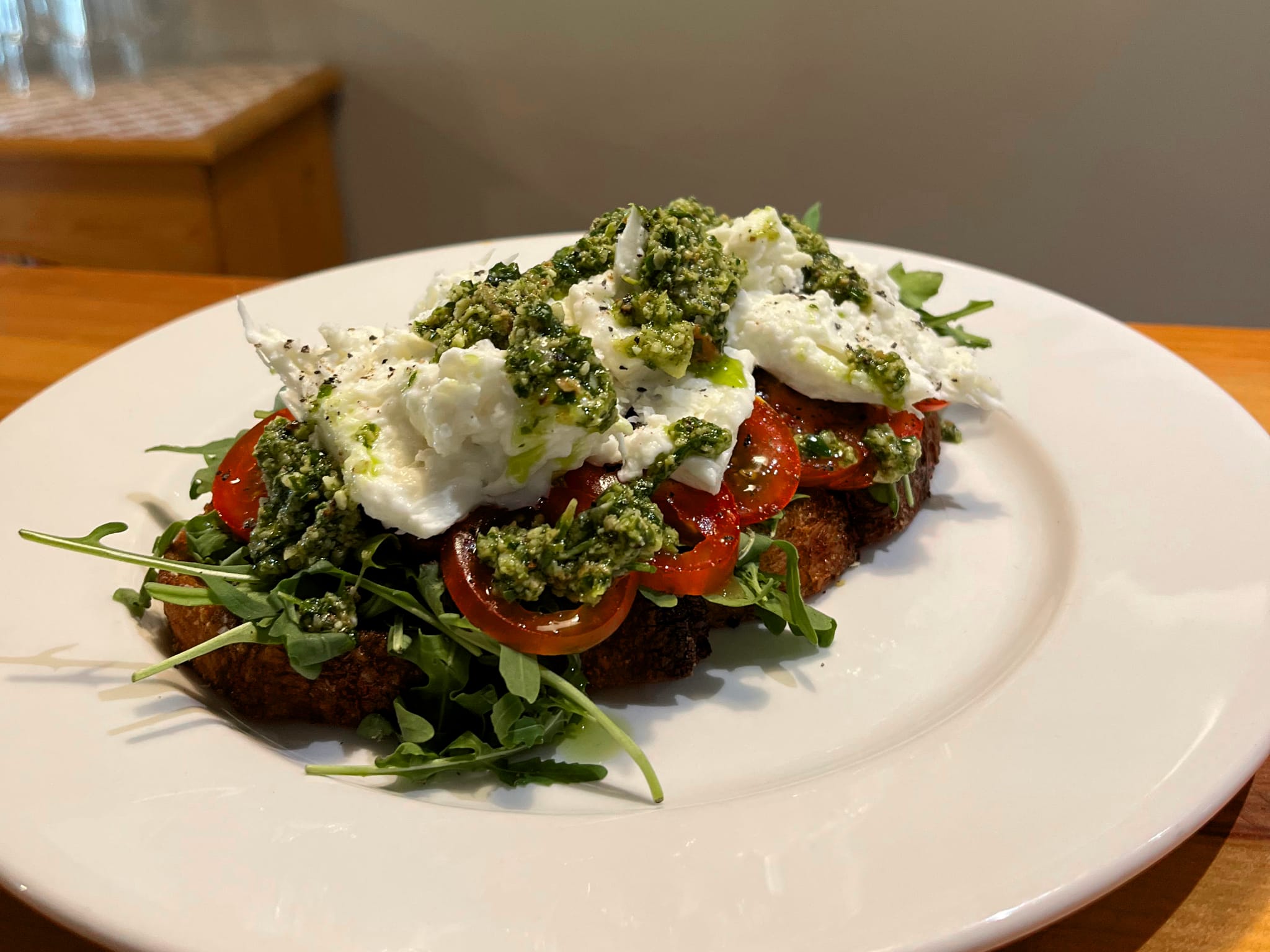 Buffalo mozzarella, tomato, basil, rocket and almond pesto bruschetta.