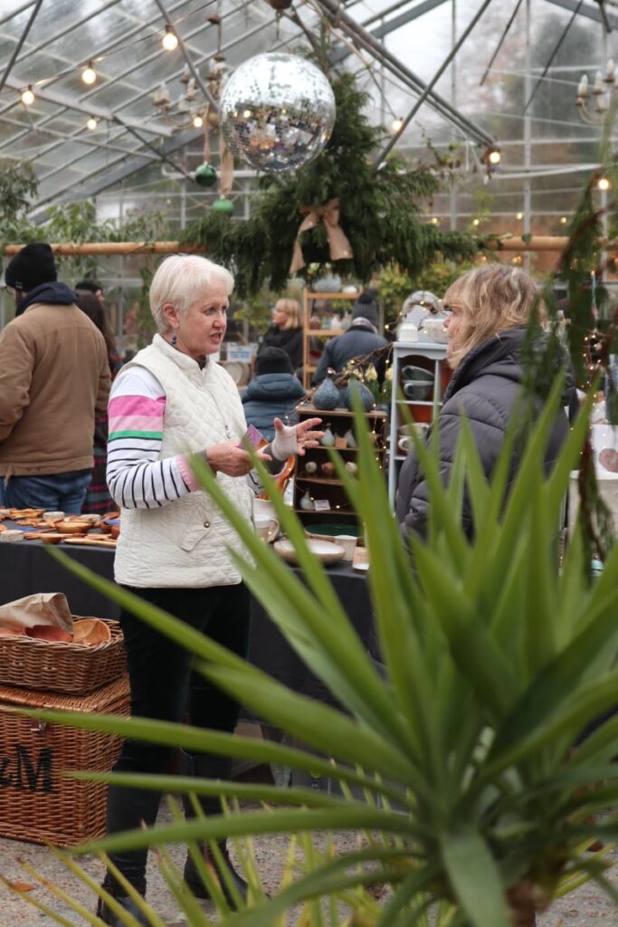 Customers chatting in the greenhouse
