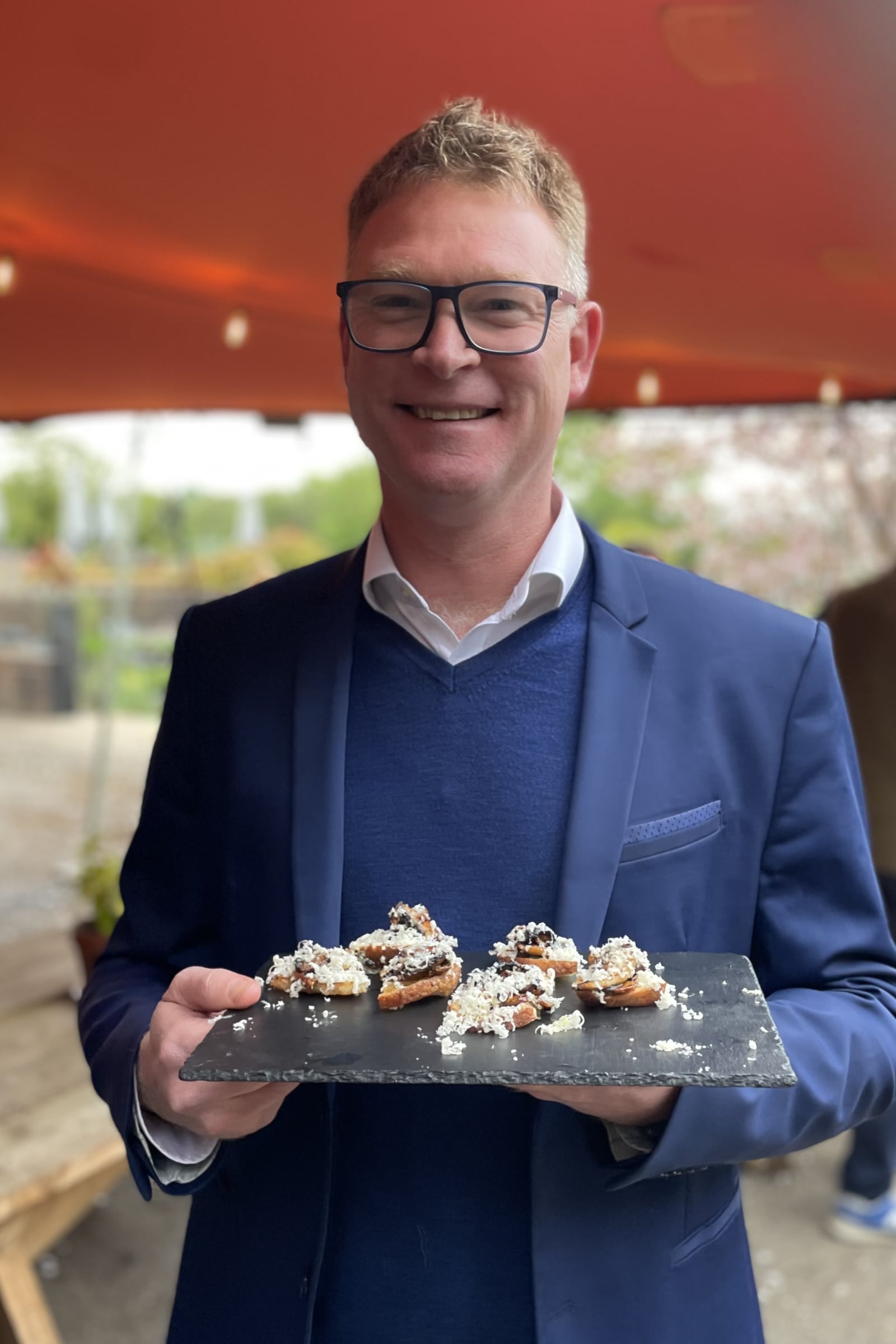 Rob serving our Marmite mushroom canapes beautifully!