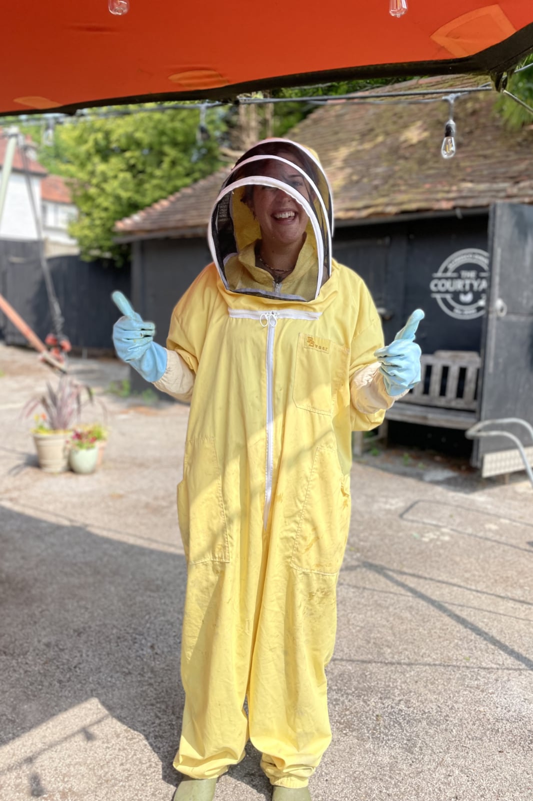 In the protective suit ready to go over the bee hives