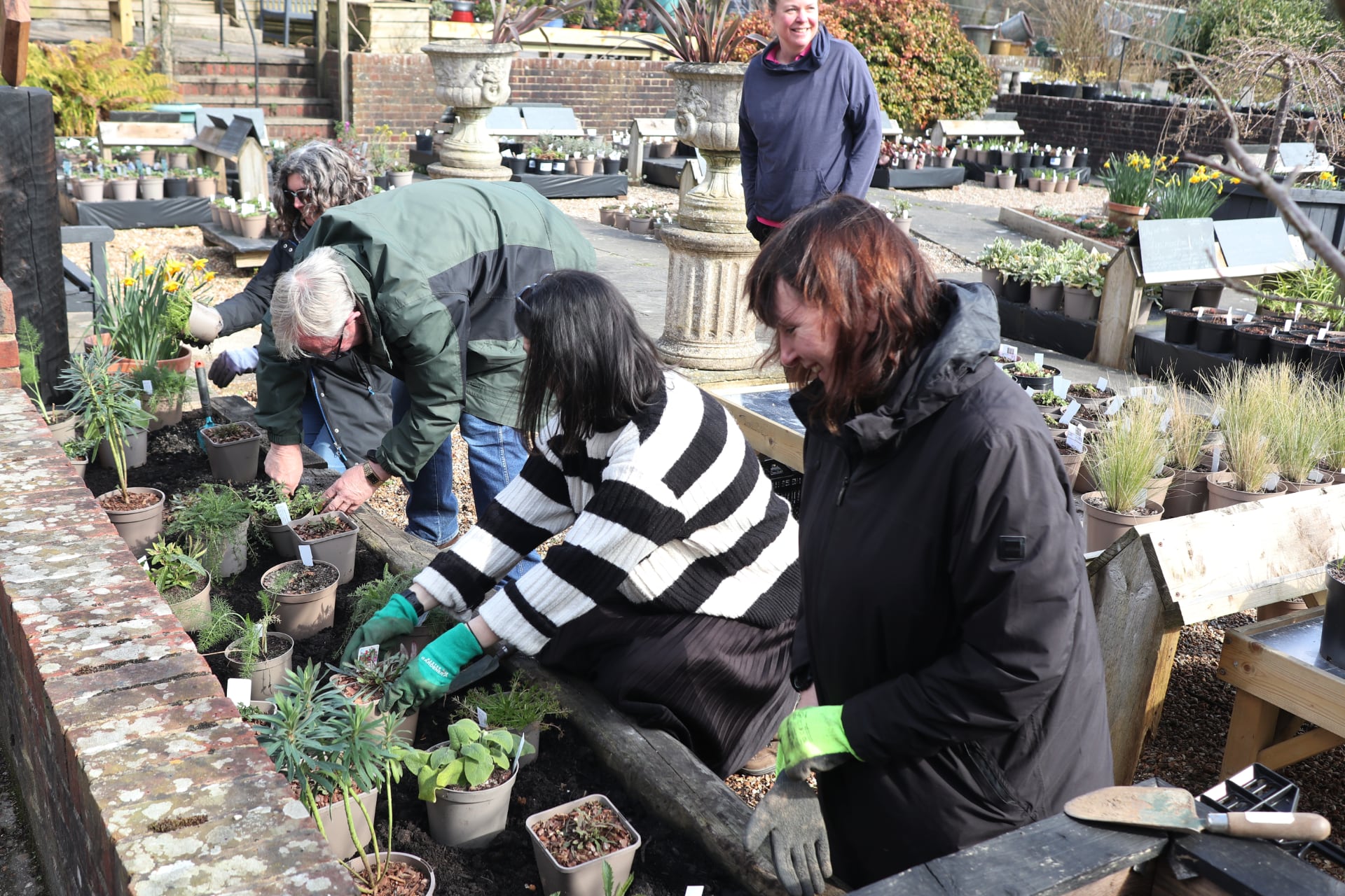Students getting stuck in to planting on our Gardening course!